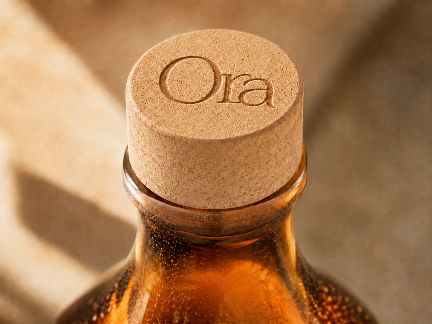 Ora bottle and glass on table